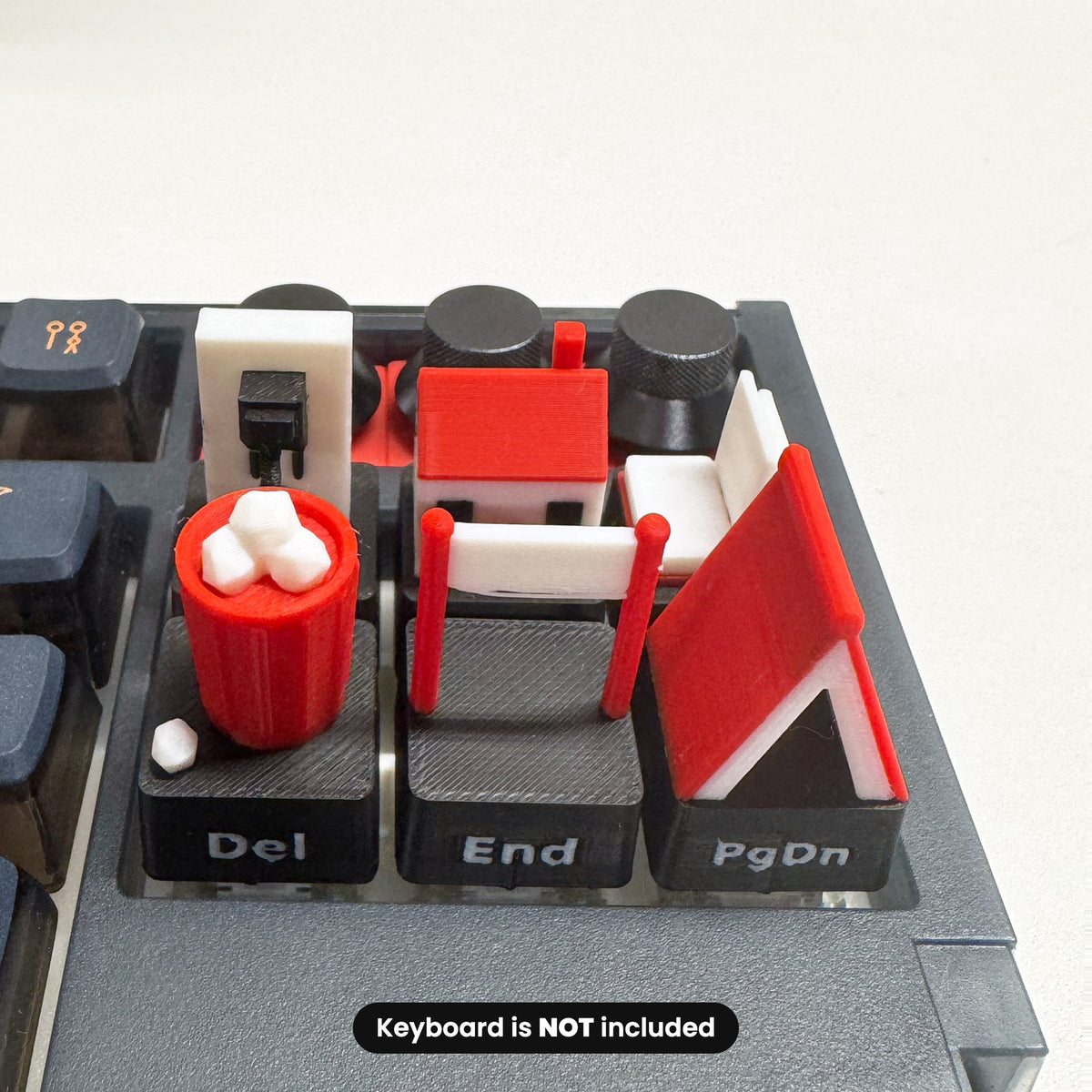 Literal Navigation Keycaps installed in a mechanical keyboard's navigation cluster